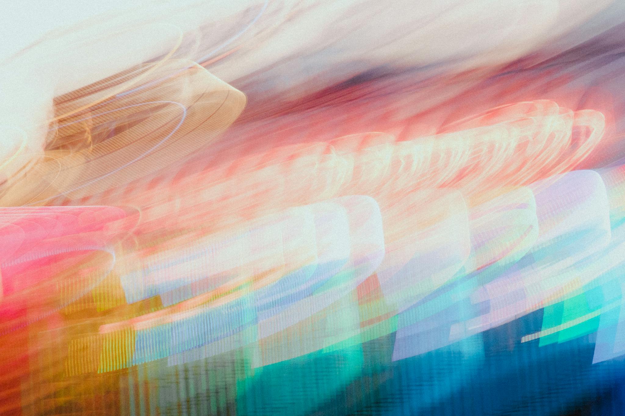 Dynamic abstract photo with colorful light streaks, creating a vibrant and artistic design.